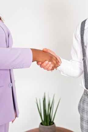 photograph of people s hands doing a handshake